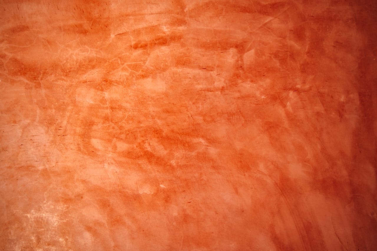 services-04 Abstract orange wall texture perfect for backgrounds and artistic projects.