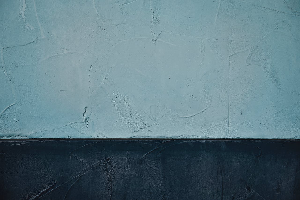 services-02 Detailed textured wall art showcasing vintage style with contrasting blue tones.