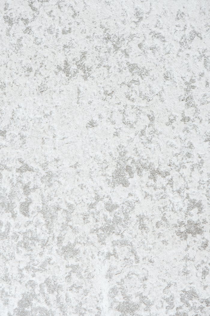 who-we-are Close-up of white and gray textured surface, ideal for backgrounds.
