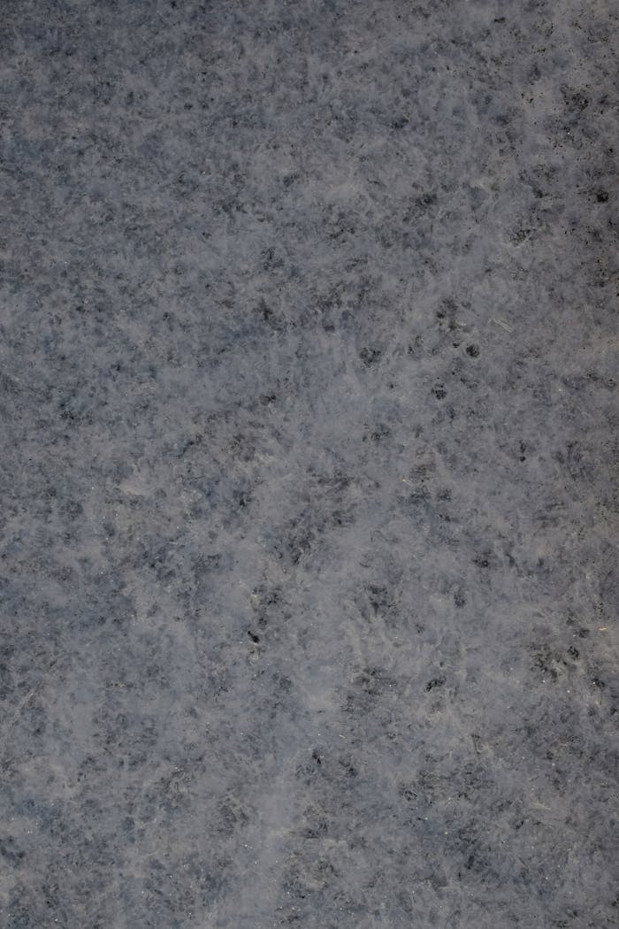 Mastering the First Impression: Your intriguing post title goes here A detailed close-up of a textured marble surface with a natural pattern.